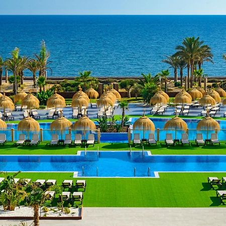 Cabogata Beach Hotel レタマル エクステリア 写真 The resort's pool area